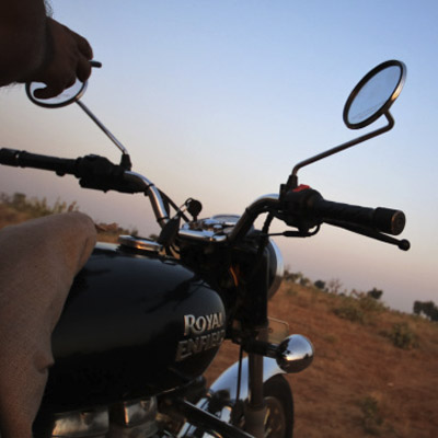 Riding the Royal Enfield motorcycle tour outside Pushkar