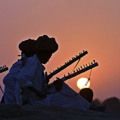Musicians at sunset in the Rajasthan desert