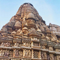 Erotic sculptures of Khajuraho Monuments with Tour Guide & Driver